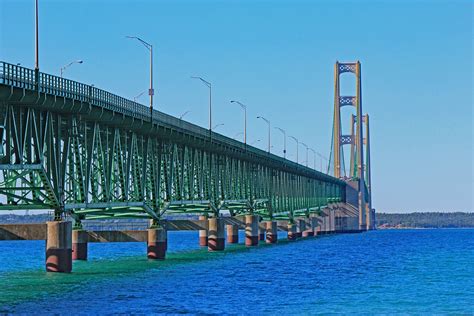 Bridge michigan - The Mackinac Bridge ( / ˈmækənɔː / MAK-ə-naw; also referred to as the Mighty Mac or Big Mac) [4] is a suspension bridge that connects the Upper and Lower peninsulas of the U.S. state of Michigan. It spans the Straits of Mackinac, a body of water connecting Lake Michigan and Lake Huron, two of the Great Lakes. 